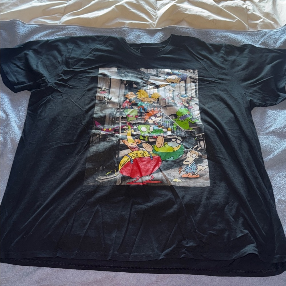 NWOT Nickelodeon Black Tee with Various Characters from Their Most Popular Shows
